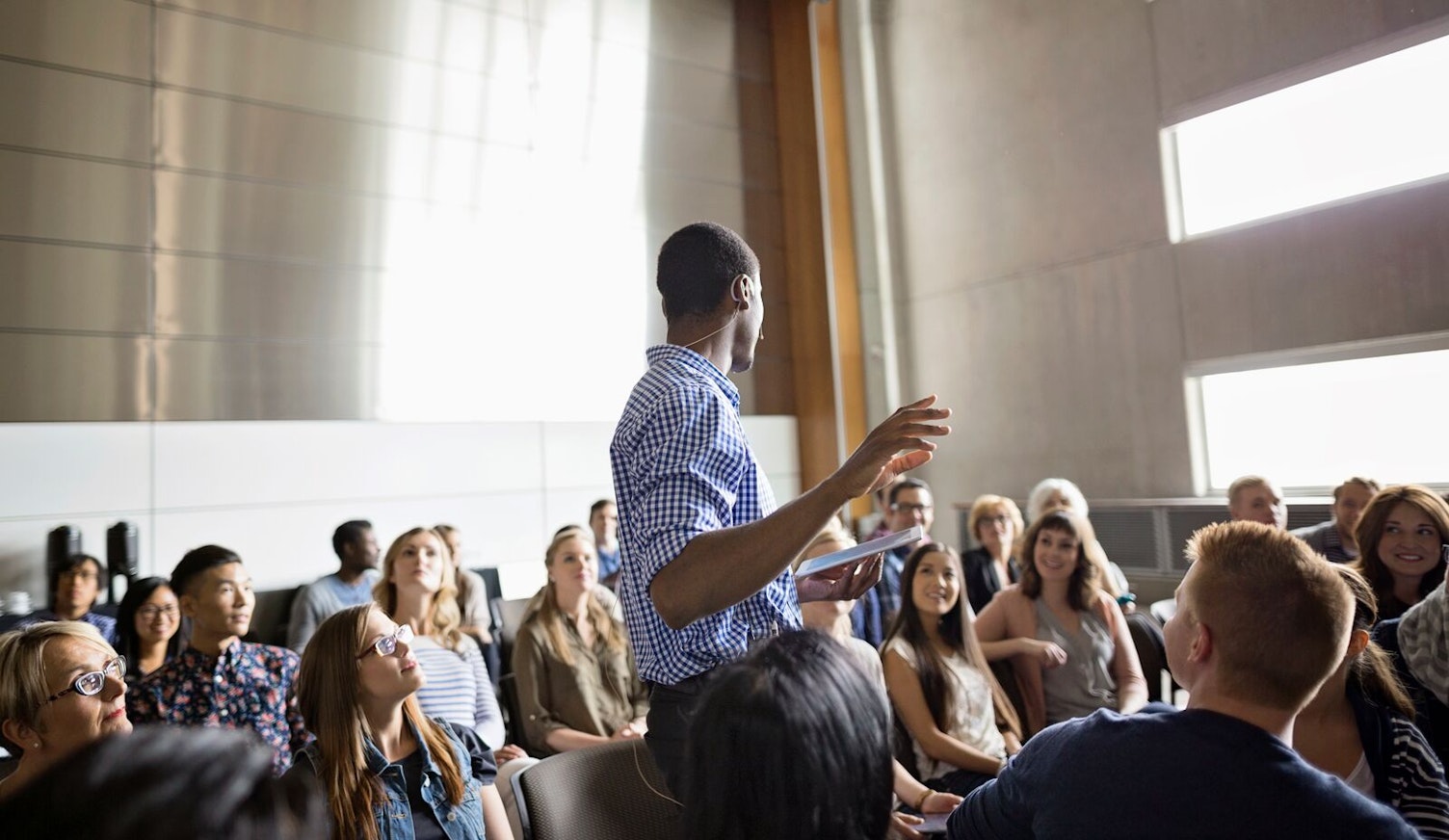 Audience Listening to a Presentation Clip