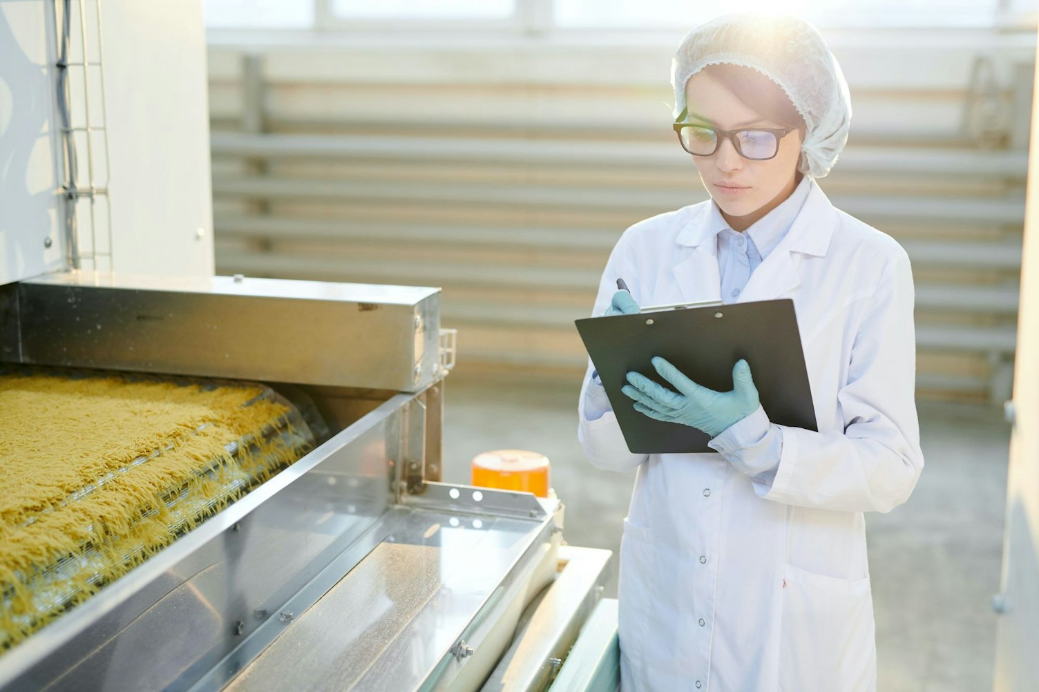 Woman Auditing Food Production Clip