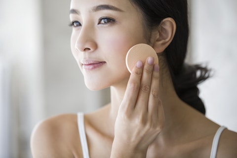 Woman Applying Face Powder