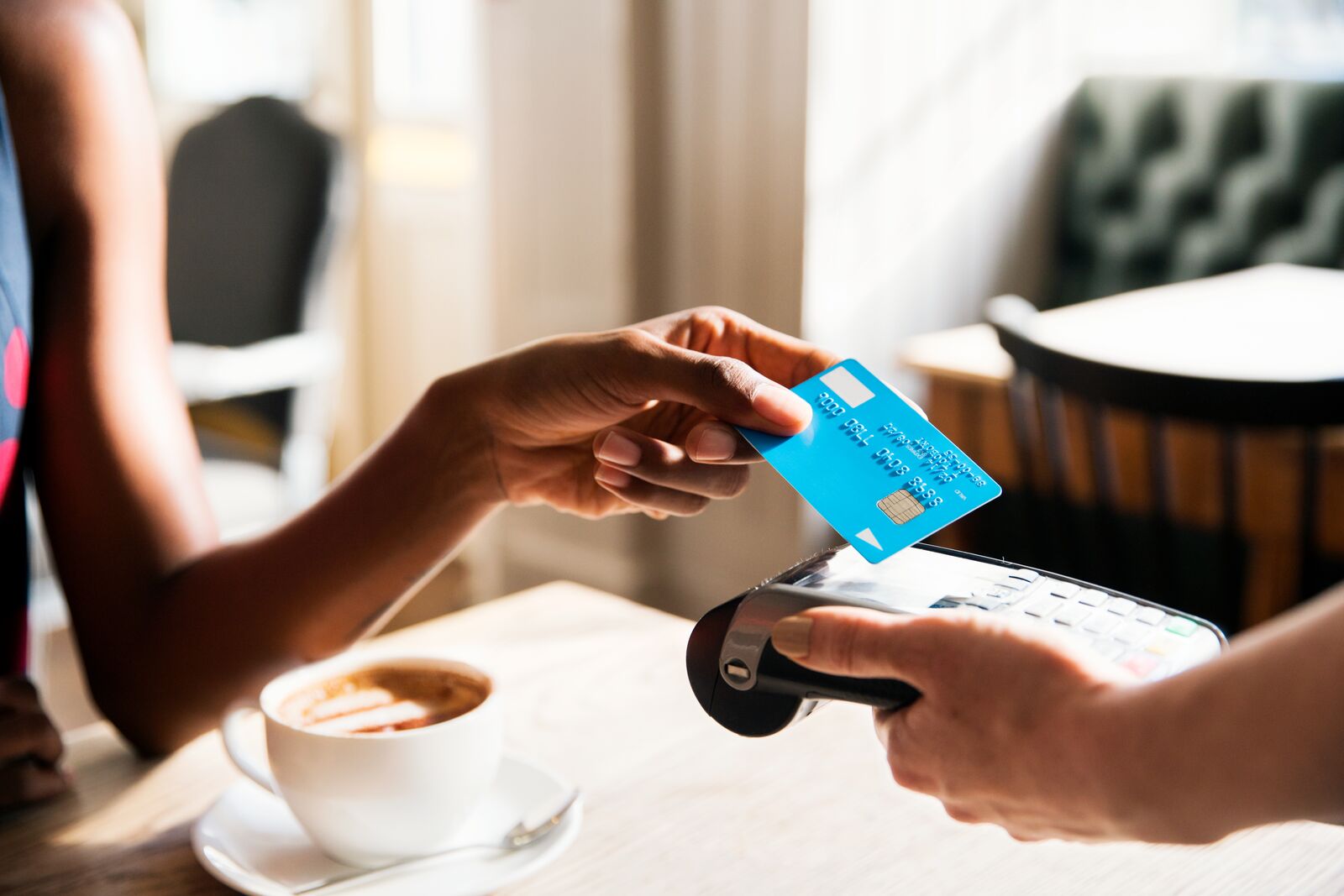 Woman Using Contactless Payment 