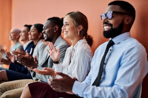 Business Colleagues Listening to a Presentation