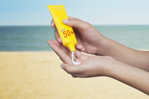 Person using Sunscreen