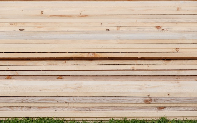 Wood planks on grass
