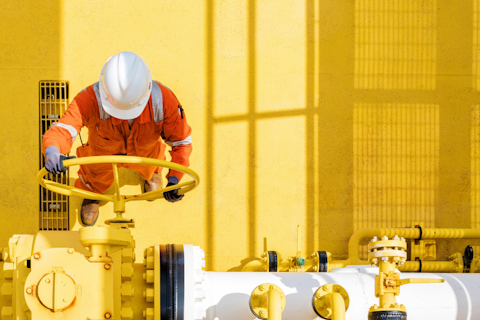 orig off shore oil and gas site service operator open valve for control gases Getty-1017736168