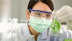 Chemist checking solution