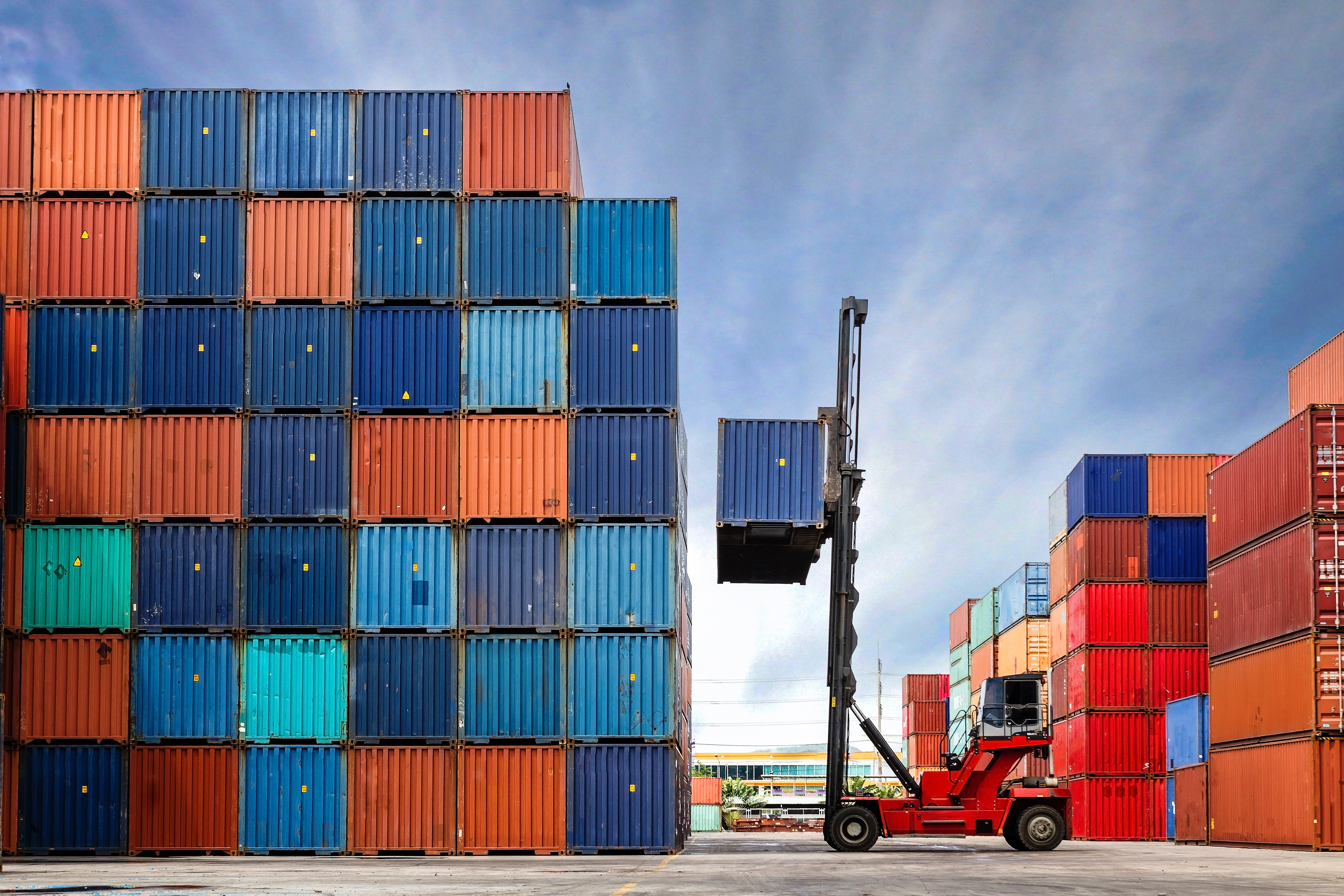 Crane Lifting Up Container 