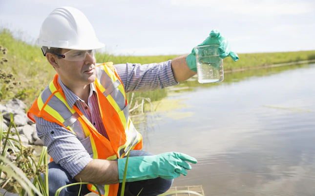 Environmental Scientist Examining Water Sample