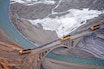 Miner's Truck Rolling on a Bridge
